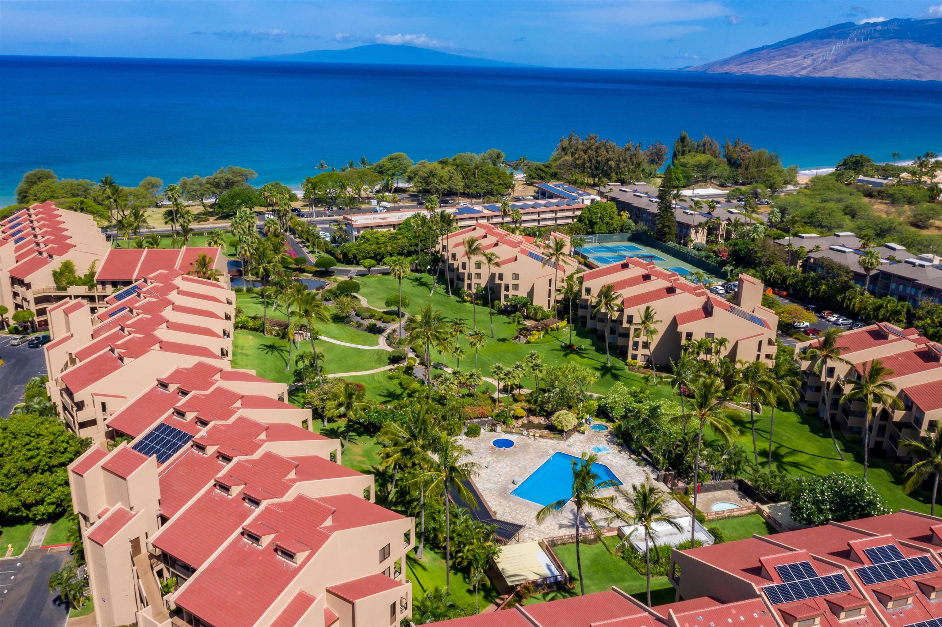 2695 South Kihei Road, Unit 10213 Kihei, HI 96753 - Photo 28 of 37 an aerial view of multiple house with yard