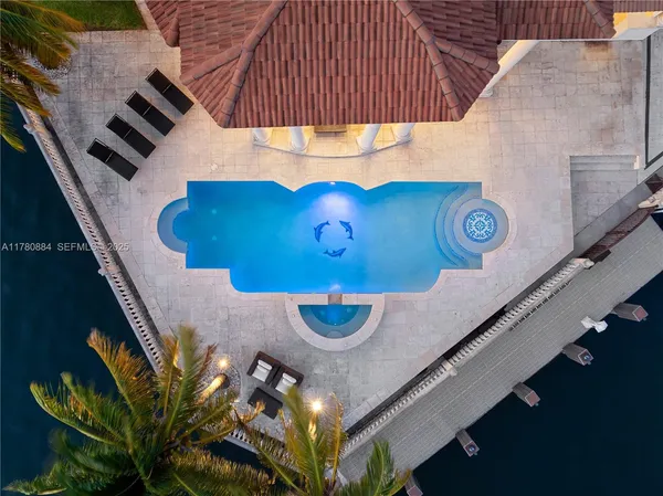 an aerial view of a house having outdoor seating