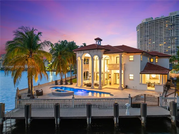 a view of a house with basketball court