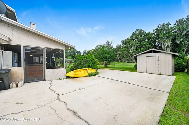 a view of a house with a swimming pool