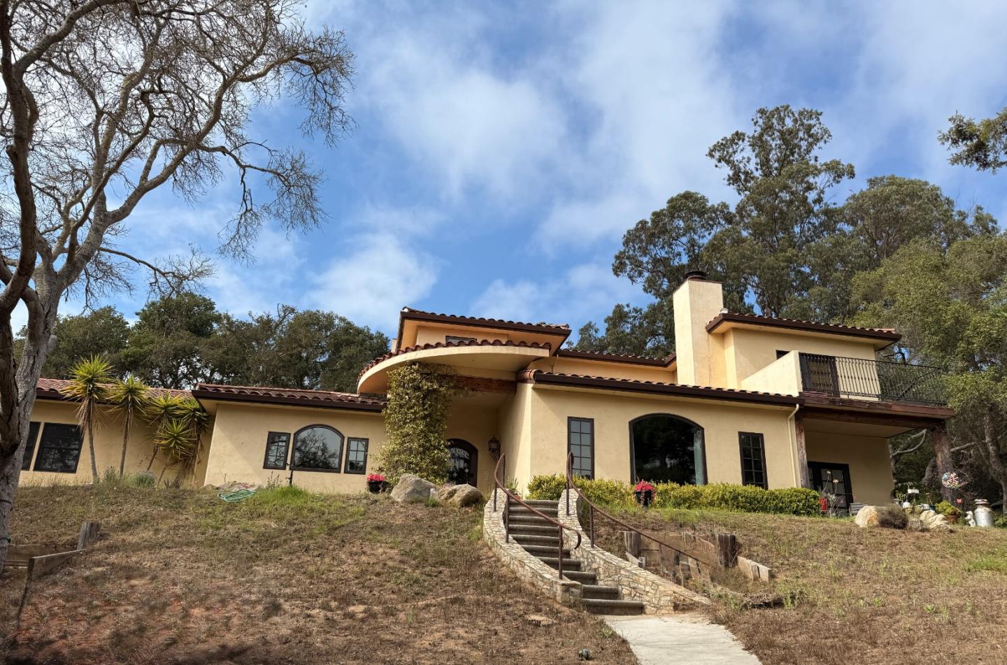 17551 Pond Derosa Lane Prunedale, CA 93907 - Photo 1 of 63 a front view of a house with garden