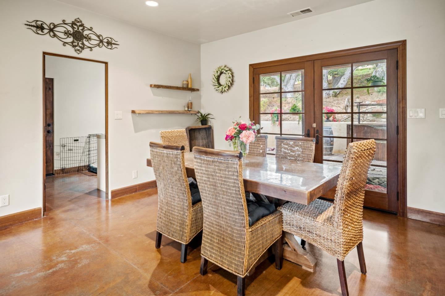17551 Pond Derosa Lane Prunedale, CA 93907 - Photo 14 of 63 a view of a dining room with furniture window and wooden floor