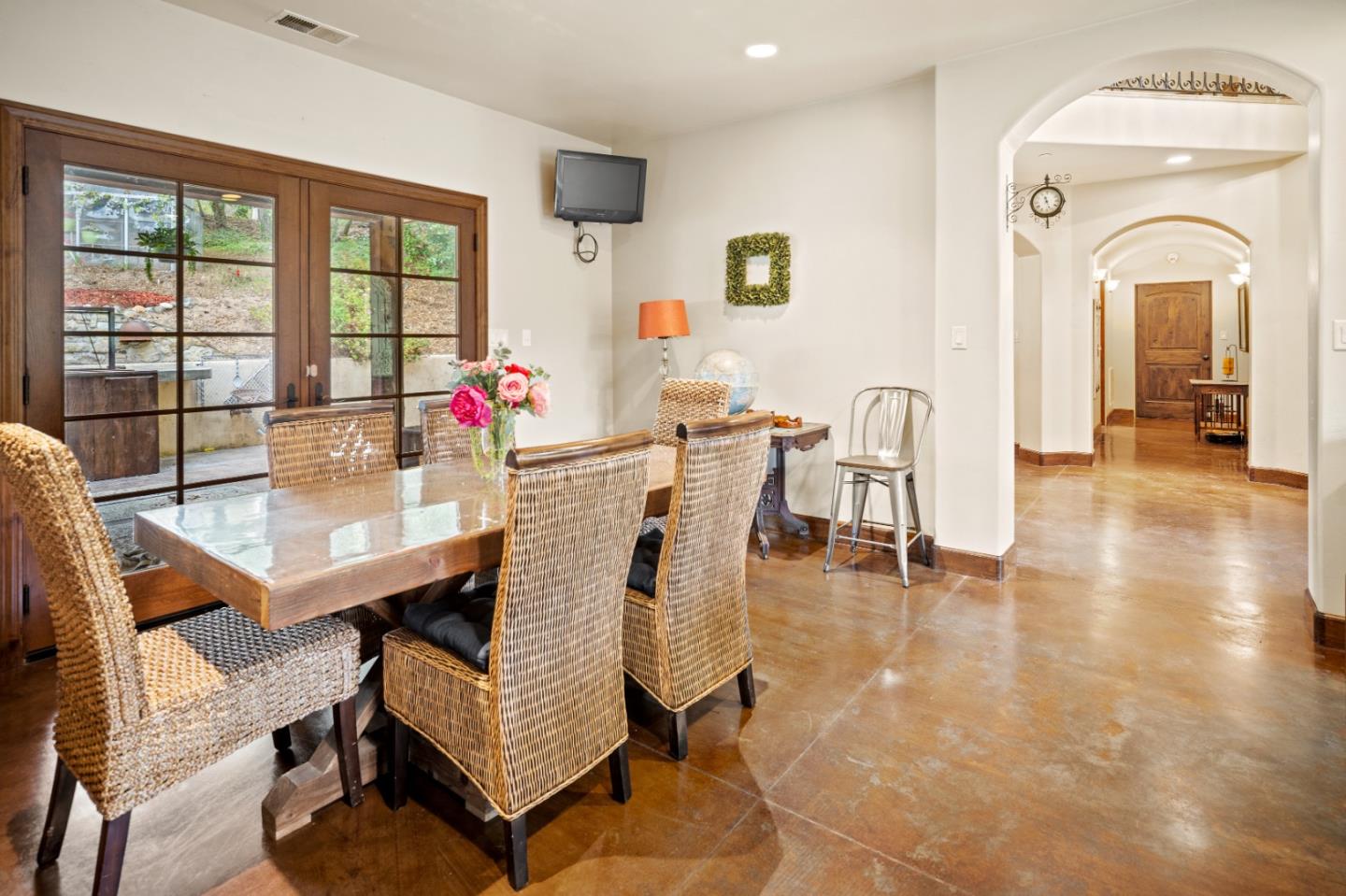 17551 Pond Derosa Lane Prunedale, CA 93907 - Photo 15 of 63 a view of a dining room with furniture window and wooden floor