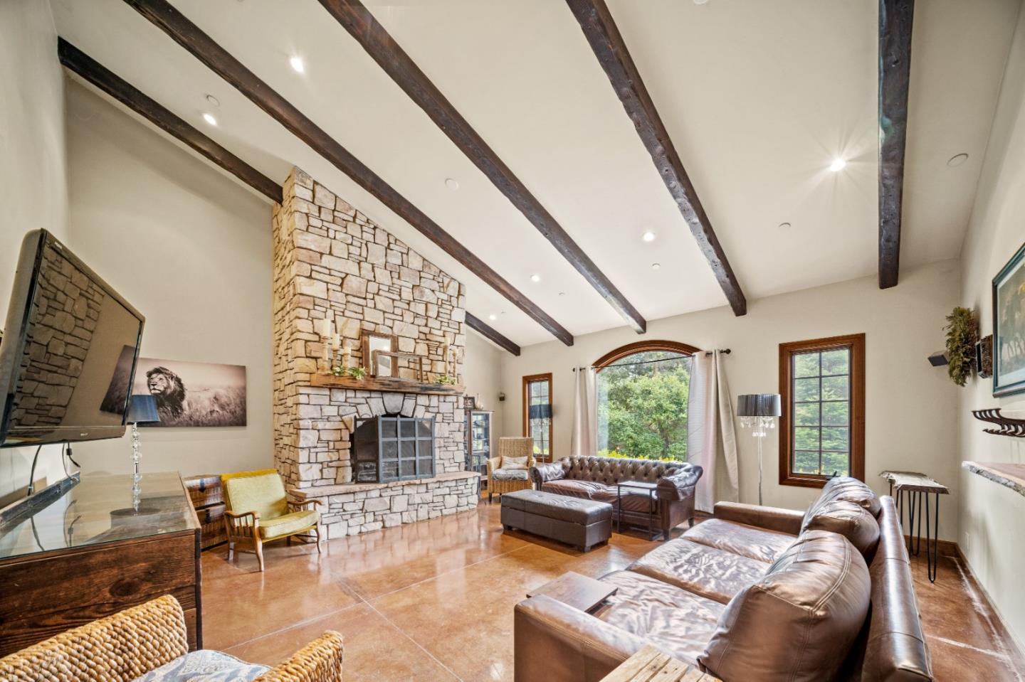 17551 Pond Derosa Lane Prunedale, CA 93907 - Photo 17 of 63 a bedroom with furniture wooden floor and a fireplace