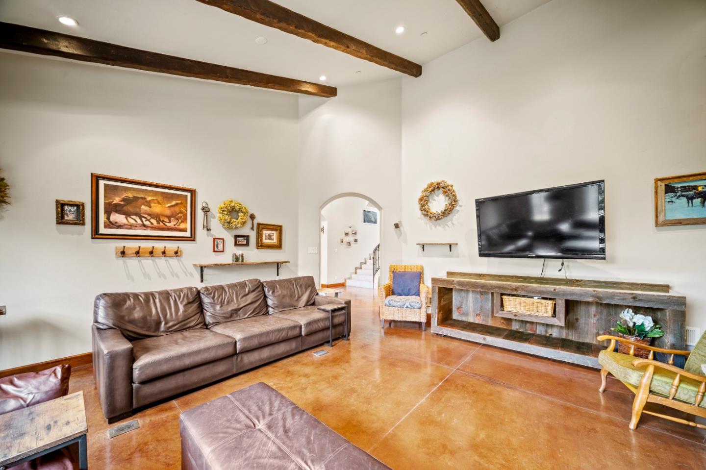 17551 Pond Derosa Lane Prunedale, CA 93907 - Photo 19 of 63 a living room with furniture and a flat screen tv