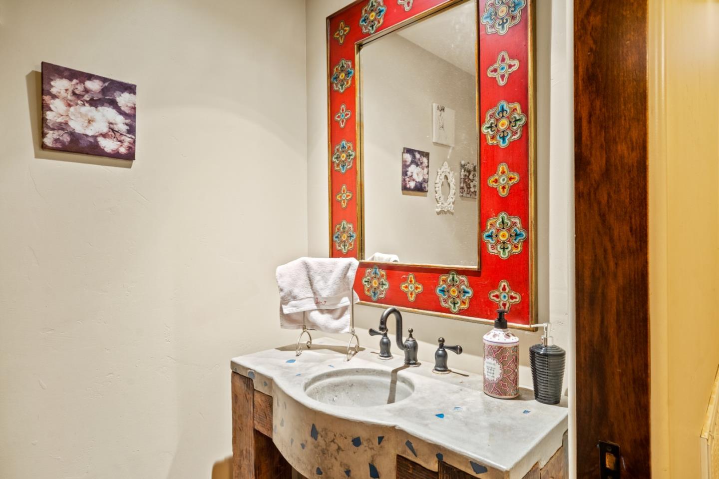 17551 Pond Derosa Lane Prunedale, CA 93907 - Photo 24 of 63 a bathroom with a sink vanity and a mirror