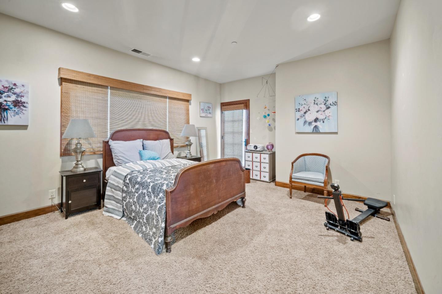 17551 Pond Derosa Lane Prunedale, CA 93907 - Photo 32 of 63 a bedroom with a bed and a table