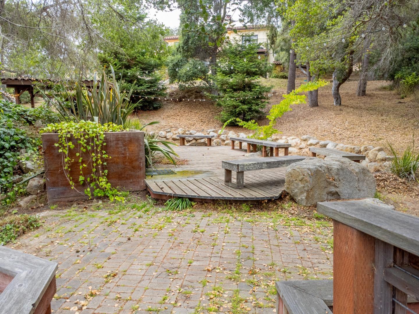 17551 Pond Derosa Lane Prunedale, CA 93907 - Photo 46 of 63 a view of a backyard with table and chairs