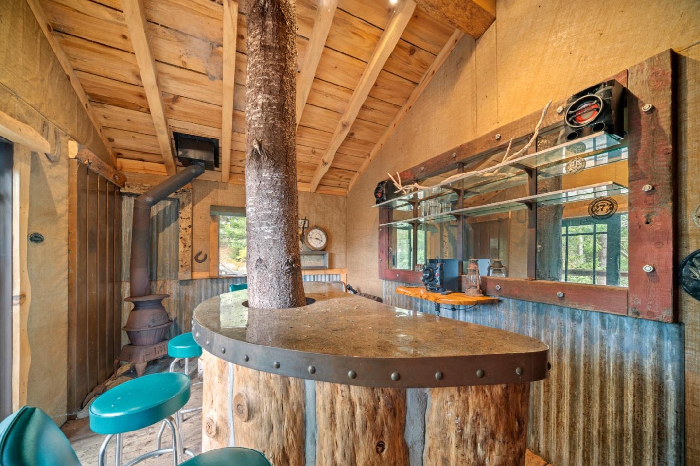 17551 Pond Derosa Lane Prunedale, CA 93907 - Photo 51 of 63 a view of a house with a table and chairs