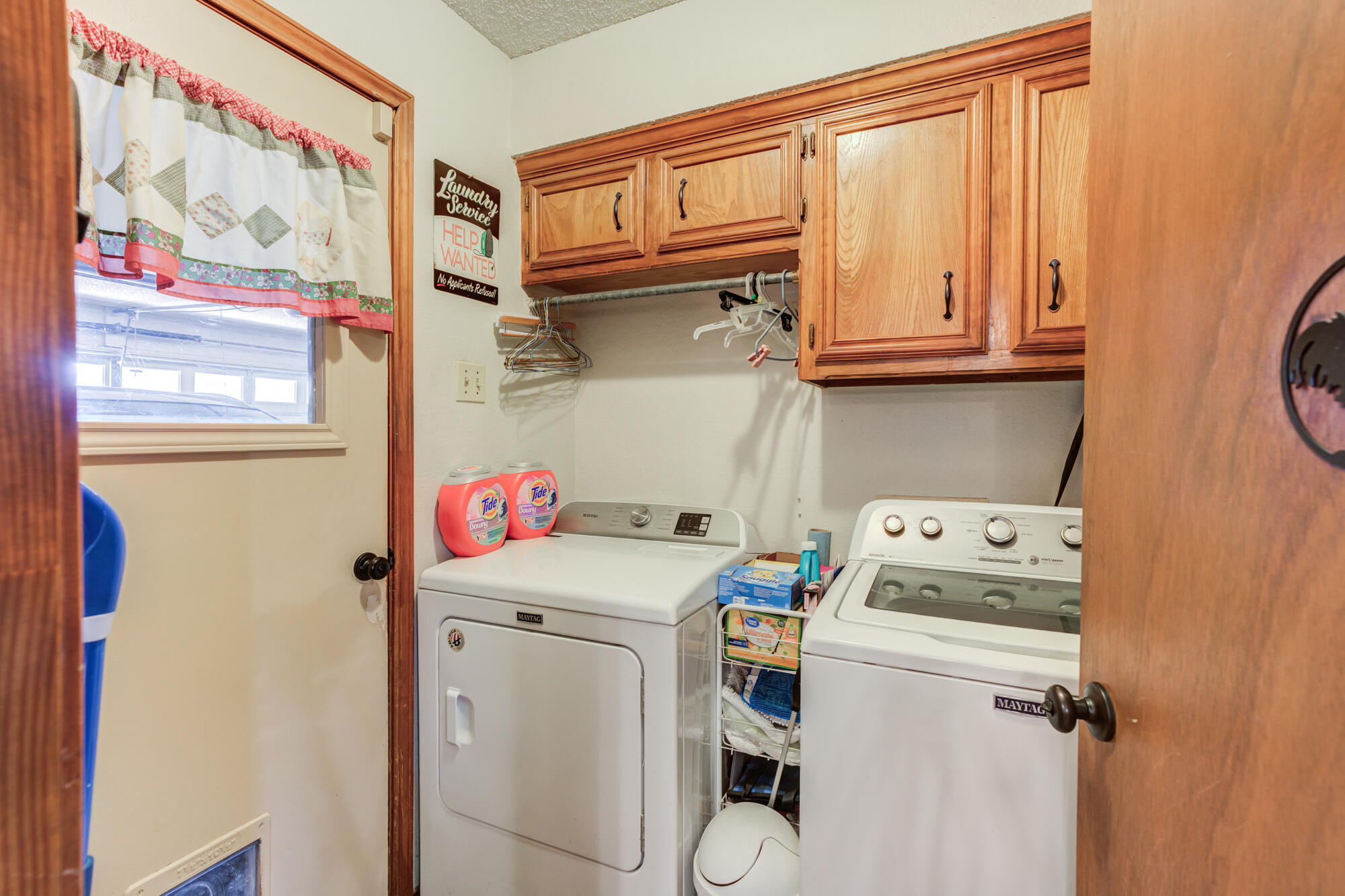 2213 86th Street Lubbock, TX 79423 - Photo 31 of 42 a utility room with dryer and washer