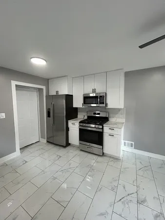 $335,000 | 8916 South Merrill Avenue, Chicago, IL 60617