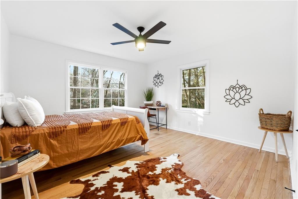 2520 Overlook Way Northeast Atlanta, GA 30345 - Photo 17 of 31 a bed sitting in a bedroom next to a window