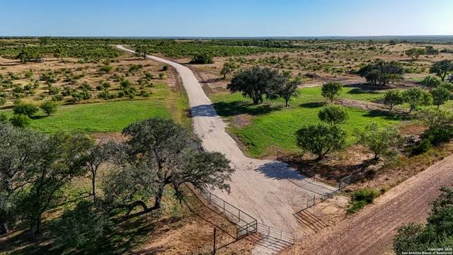 a view of a road with a yard