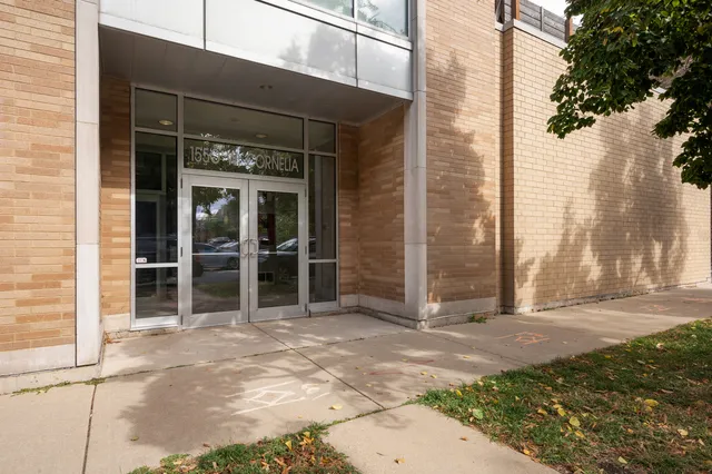 a view of a house with a large window