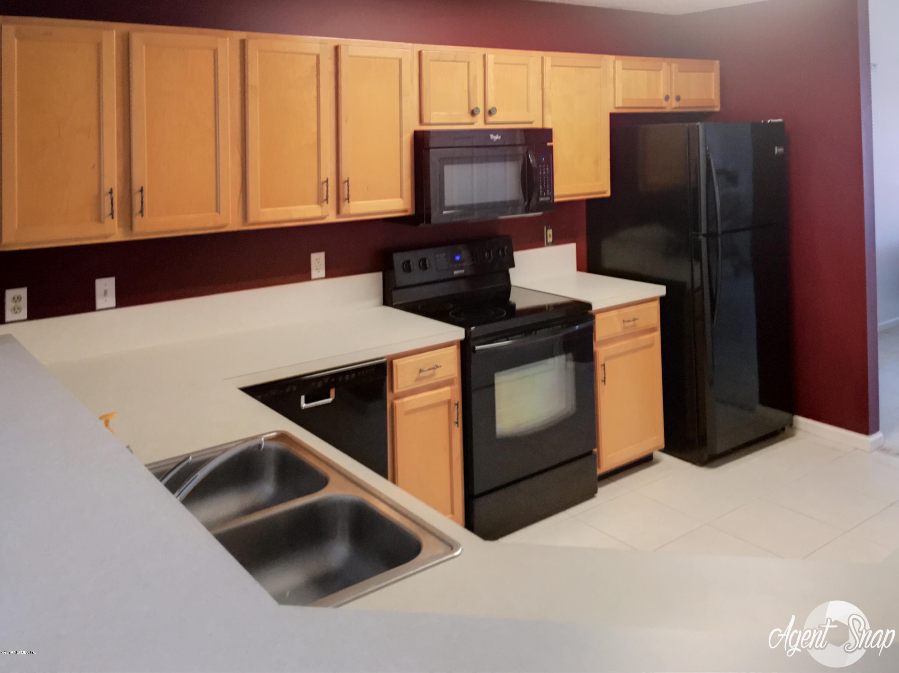 11864 Swooping Willow Road Jacksonville, FL 32223 - Photo 8 of 22 11864 swooping willow kitchen 2
