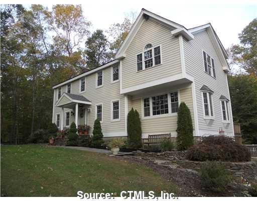 14 Kings Grant Road Clinton, CT 06413 - Photo 1 of 1 a front view of a house with a yard