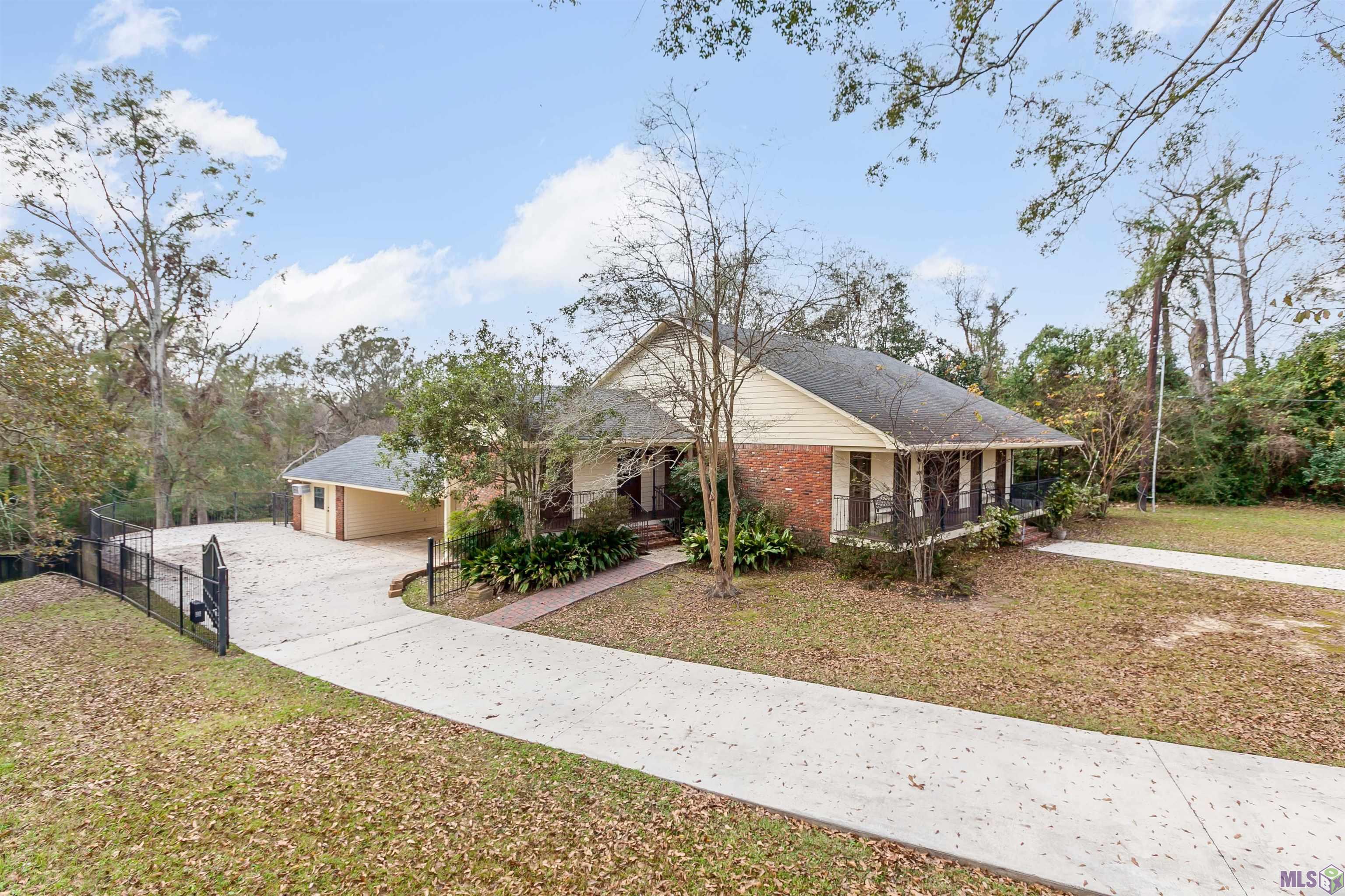 6414 Highland Road Baton Rouge, LA 70808 - Photo 25 of 25 Gated Driveway