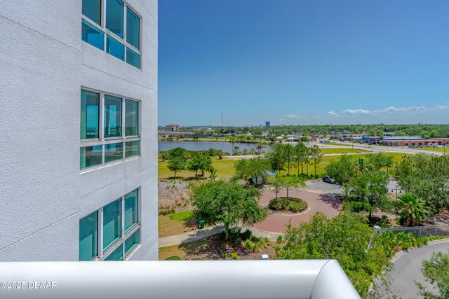 a view of a balcony with an outdoor space
