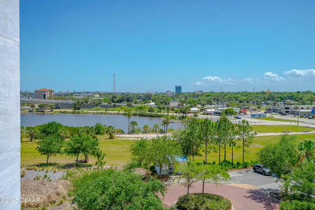 a view of a lake with a city