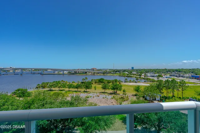 a view of a lake from a balcony
