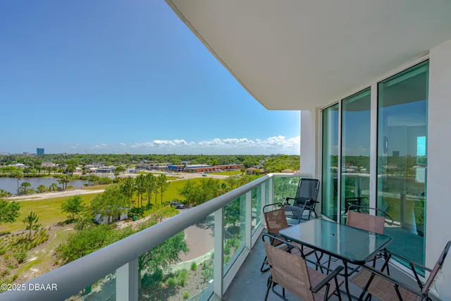 a view of swimming pool from a balcony