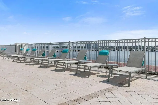 a view of a terrace with chairs