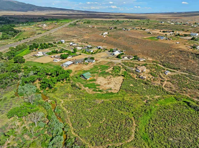 a view of a lake with a city
