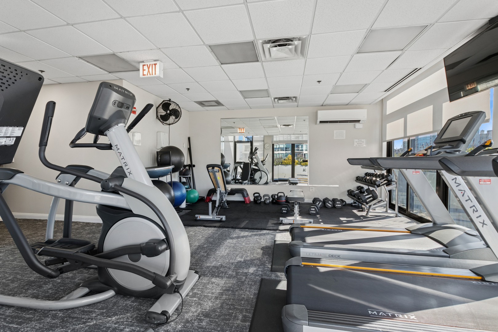 435 West Erie Street, Unit 1408 Chicago, IL 60654 - Photo 17 of 21 a view of a room with gym equipment