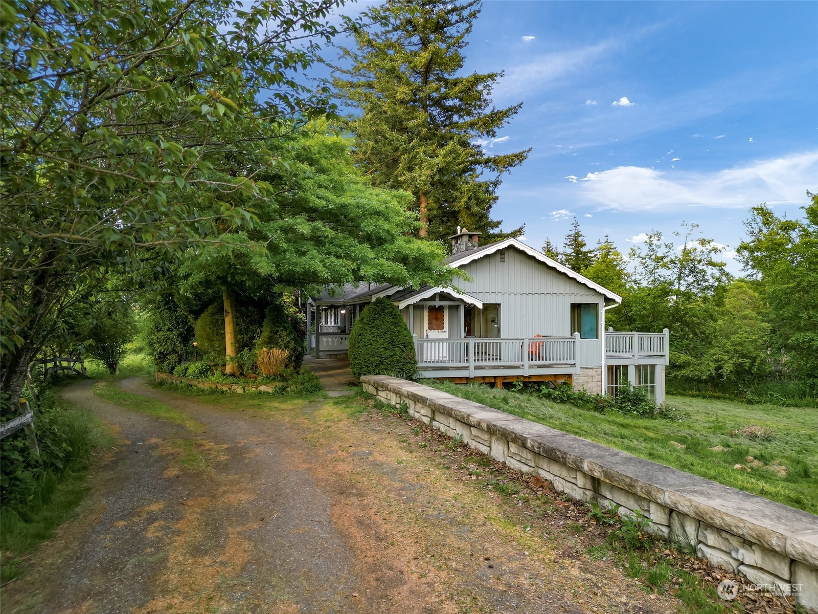 2835 Thornton Road Ferndale, WA 98248 - Photo 1 of 37 a view of house with a big yard and large trees