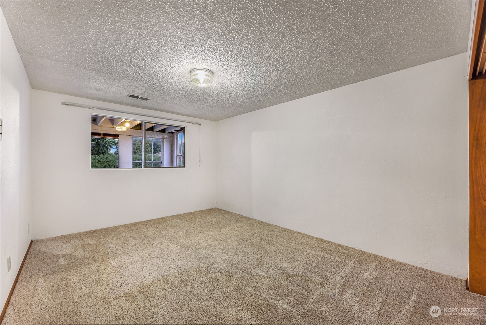 2835 Thornton Road Ferndale, WA 98248 - Photo 33 of 37 an empty room with windows
