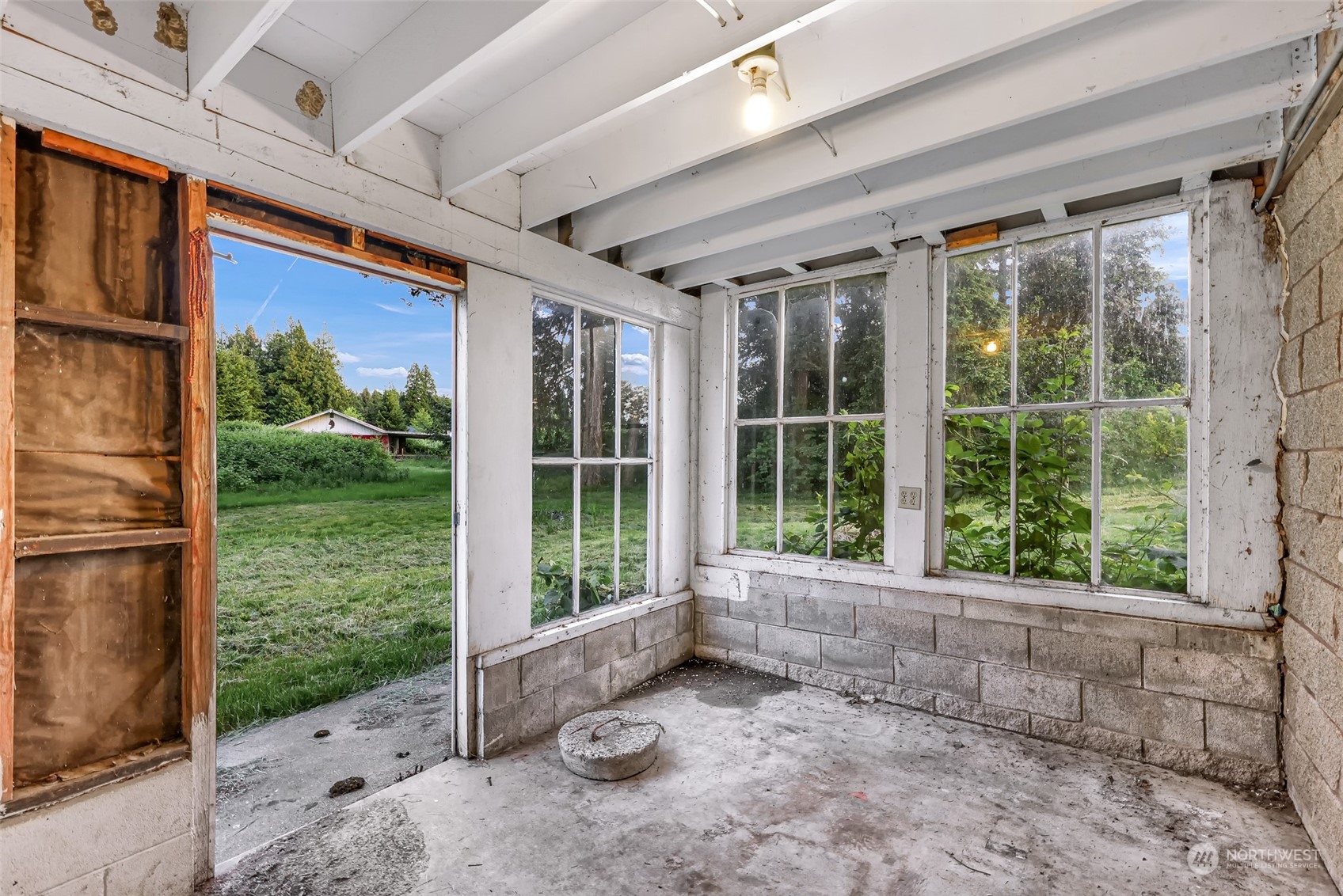 2835 Thornton Road Ferndale, WA 98248 - Photo 36 of 37 a view of a porch with a floor to ceiling window