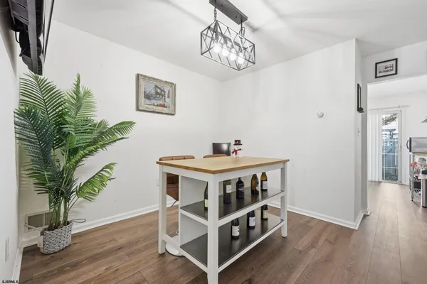 a view of livingroom with furniture and wooden floor