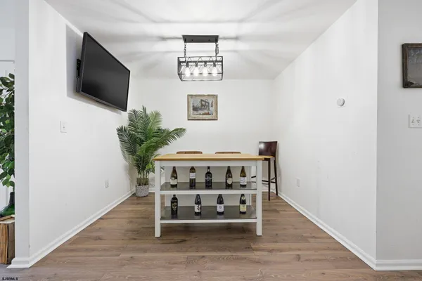 a view of entryway with wooden floor