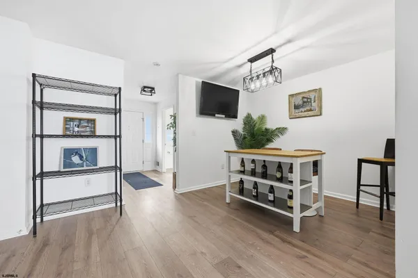 a view of livingroom with furniture and wooden floor