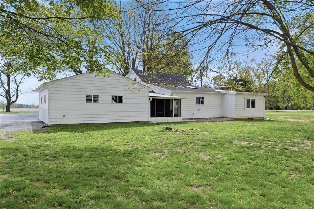 2950 Fairfield Pike Springfield, OH 45502 - Photo 39 of 48 This expansive backyard offers ample green space and a serene setting.