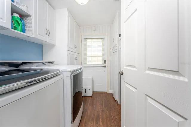 a view of a kitchen from the hallway
