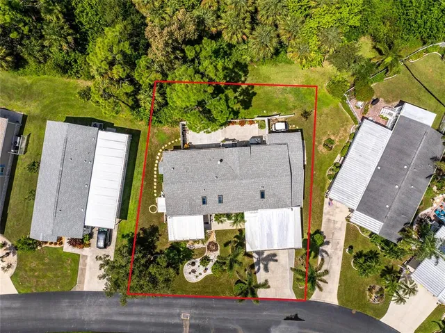 an aerial view of residential house with outdoor space