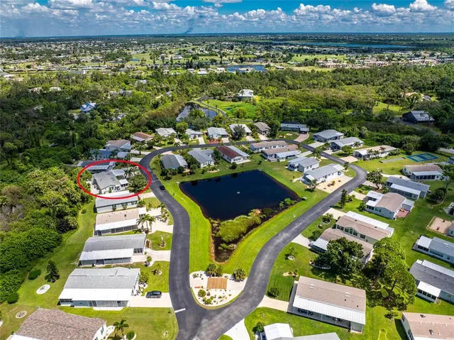a view of a city with lots of green space