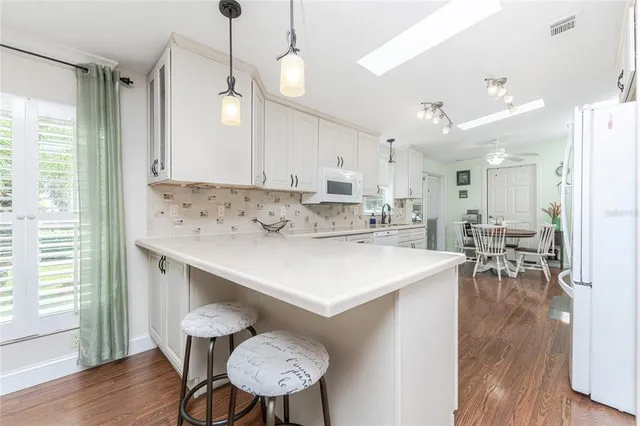 a view of kitchen center island and living room
