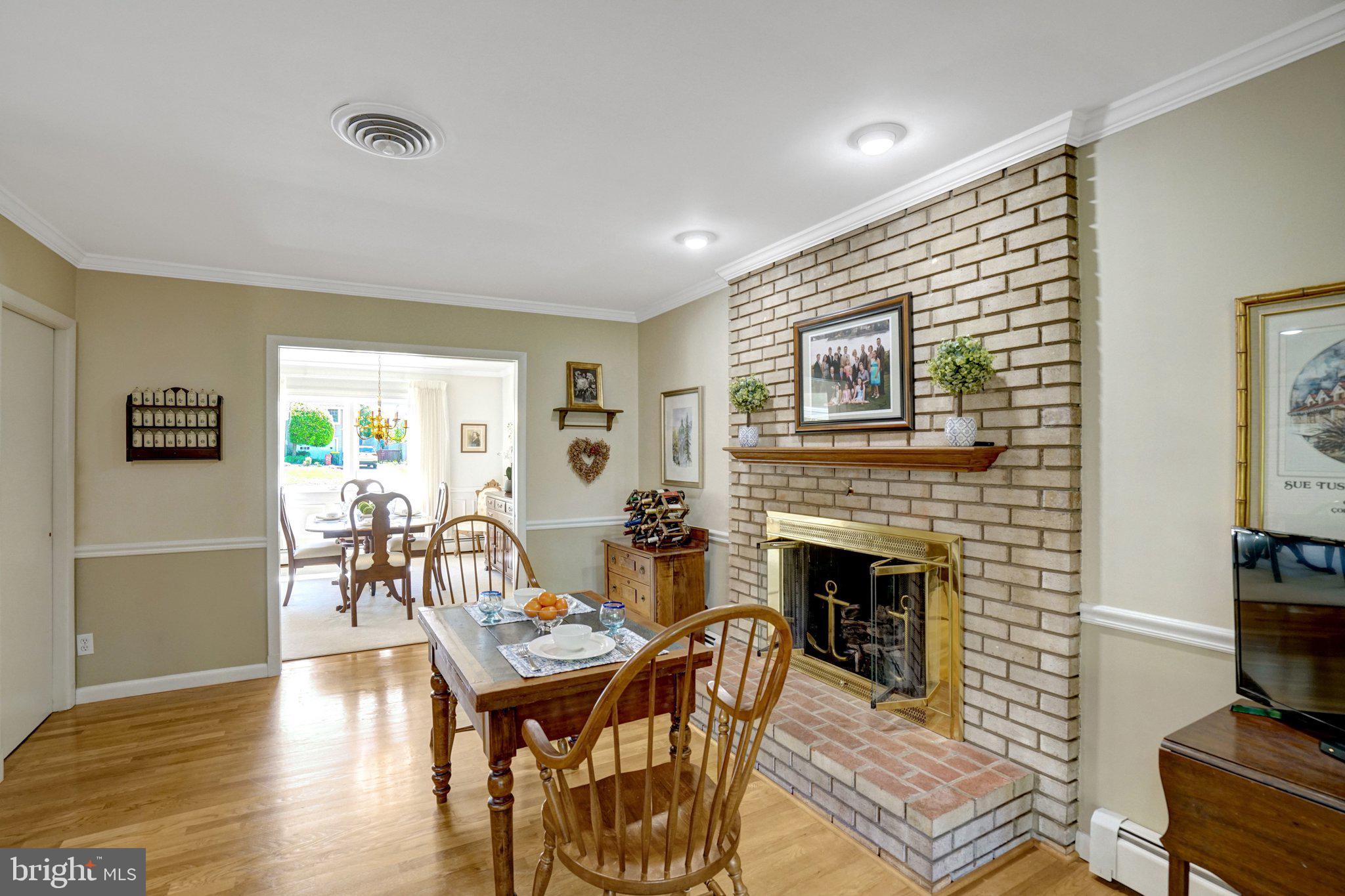 1812 A Birch Road McLean, VA 22101 - Photo 12 of 59 Charming living space with cozy fireplace.