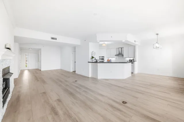 a view of kitchen with wooden floor