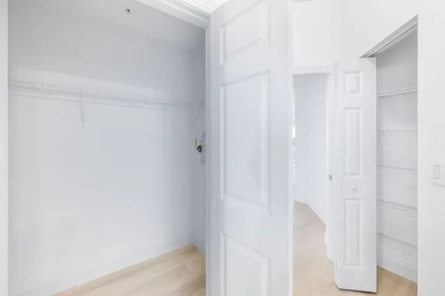 a view of multiple houses with a street