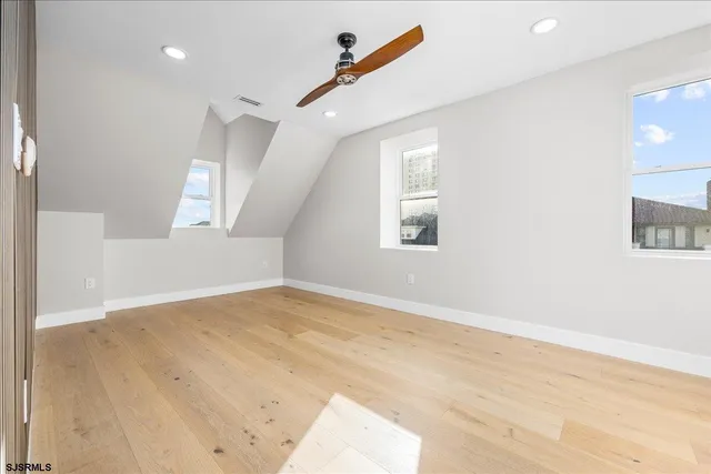 a picture of a bathroom with a shower