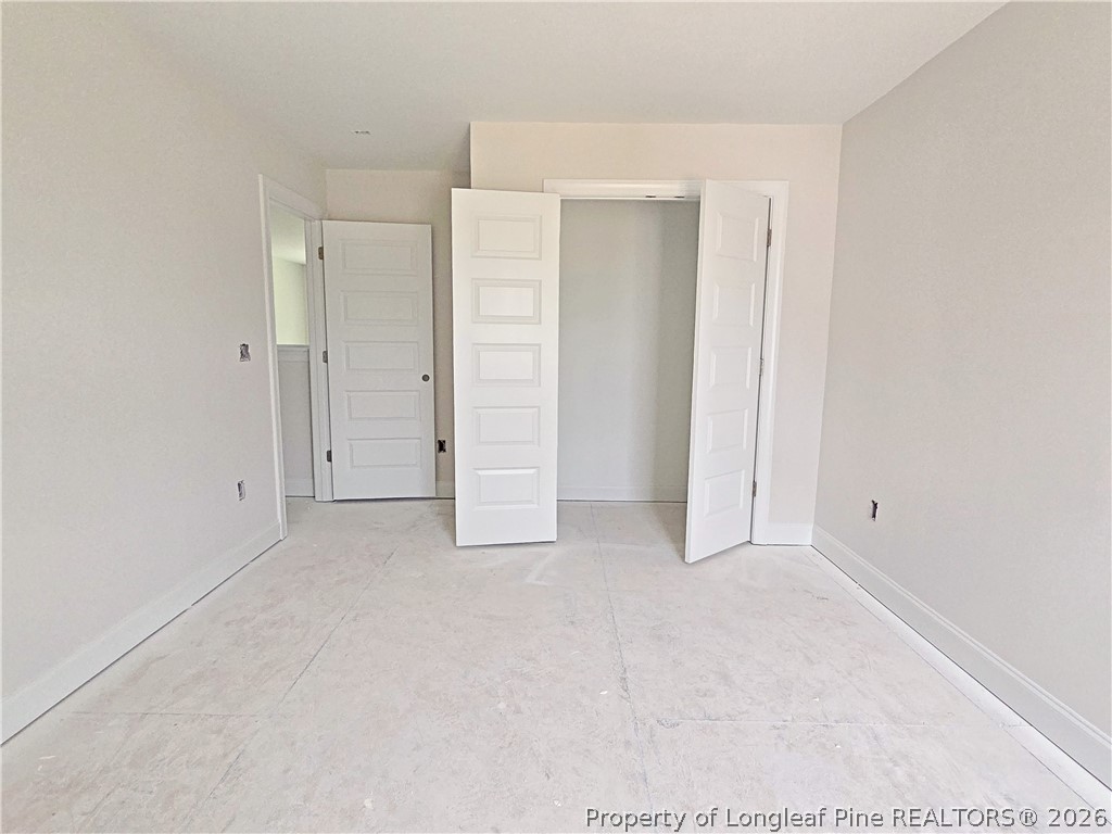 2678 Norrington Road Lillington, NC 27546 - Photo 24 of 31 an empty room with closet area