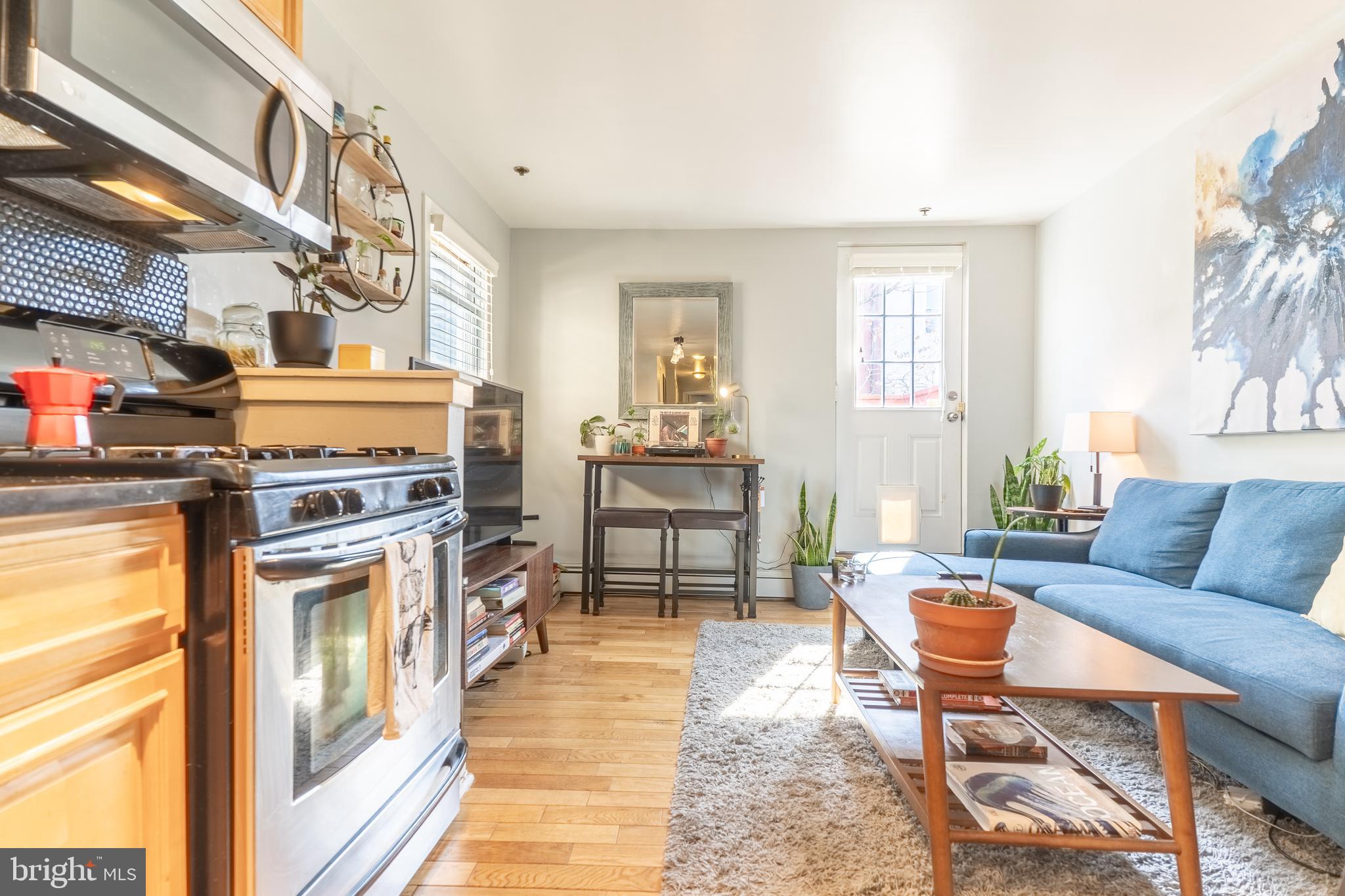 2124 Christian Street, Unit B Philadelphia, PA 19146 - Photo 4 of 17 living room/kitchen