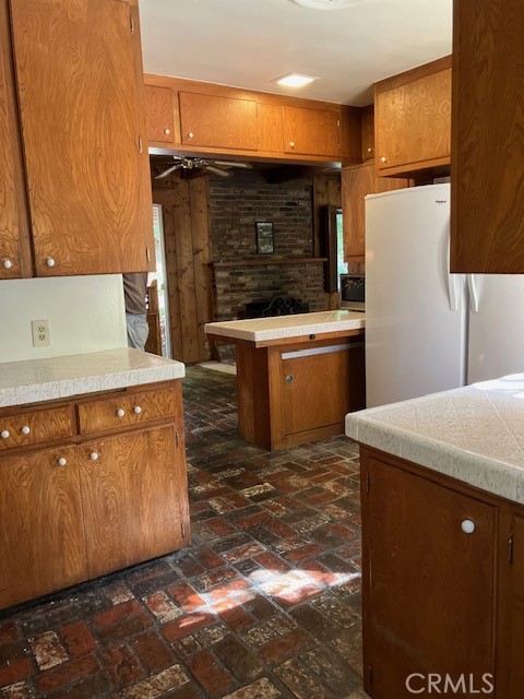 9656 Green Verdugo Drive Shadow Hills, CA 91040 - Photo 17 of 54 a kitchen with stainless steel appliances granite countertop a sink stove and refrigerator