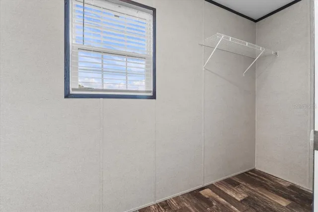 a view of a room with racks on the wall