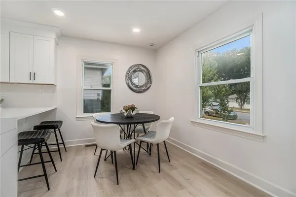 a view of a table and chairs in a room