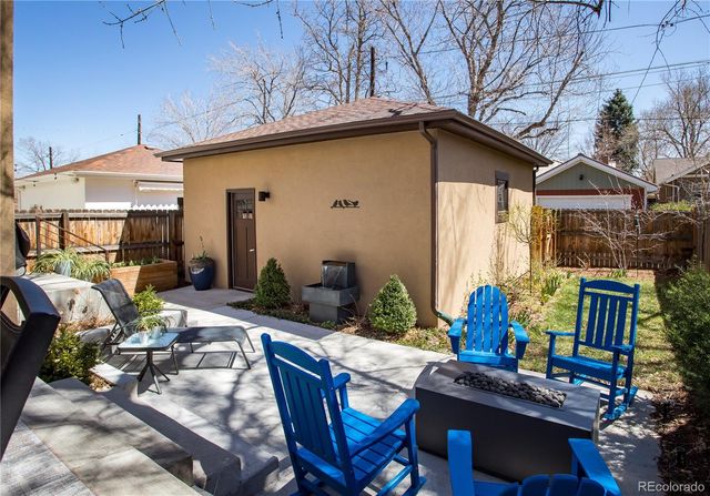 an outdoor space with patio furniture