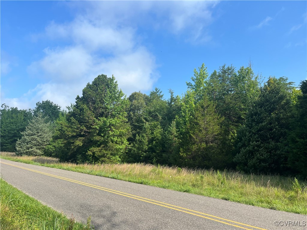 a view of a yard from a balcony